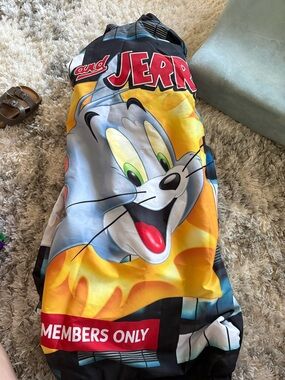 2 members mark rain jackets